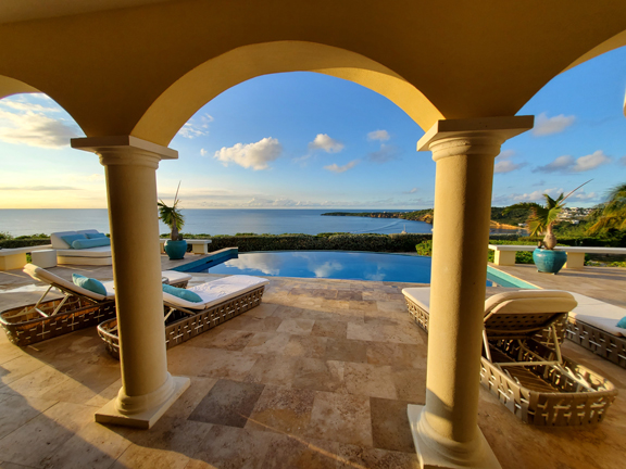 Deck with pool and Crocus Bay